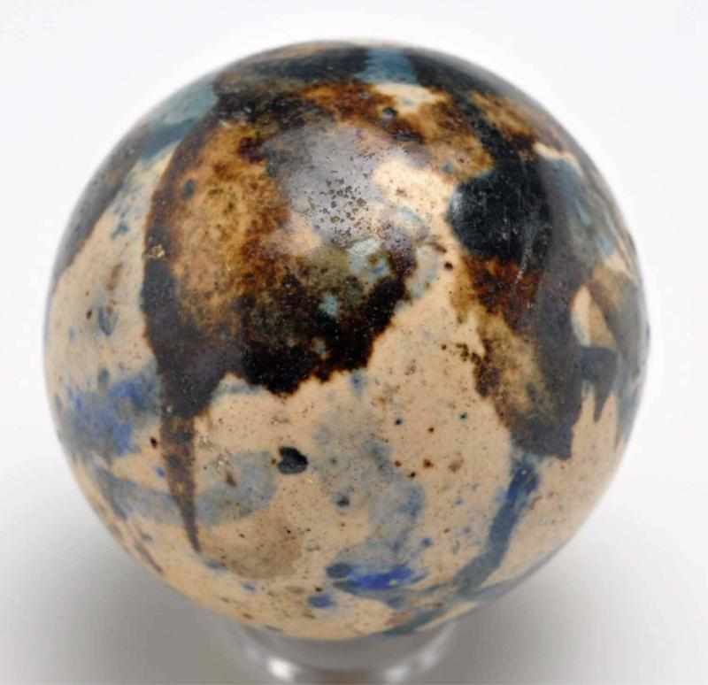 Appraisal: Large Stoneware Marble Description Blue and brown decoration probably made