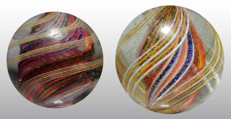 Appraisal: Lot of Divided Core Swirl Marbles Description Both divided core