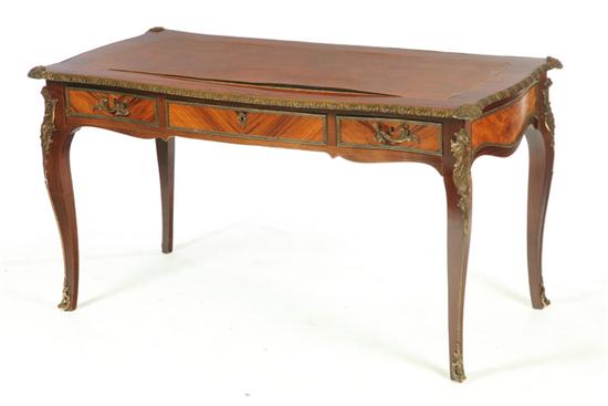 Appraisal: LOUIS XV-STYLE DESK Twentieth century mixed woods Leather top brass