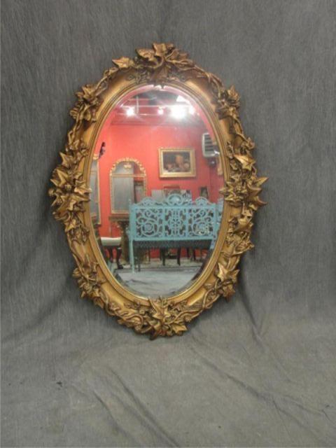 Appraisal: Ornate th Century Giltwood Oval Mirror From a Long Island