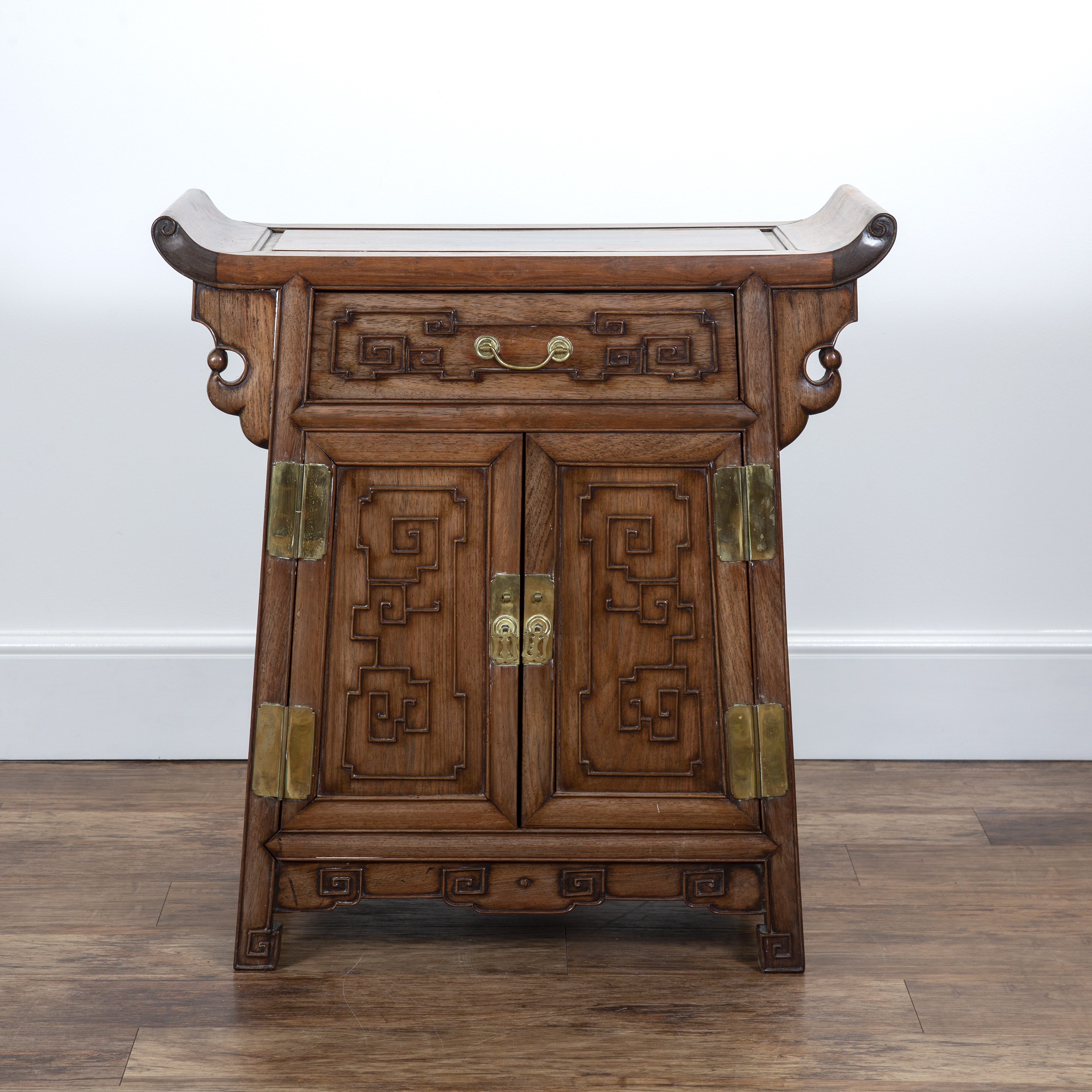 Appraisal: Carved 'Ming' style cabinet Chinese th Century fitted with a