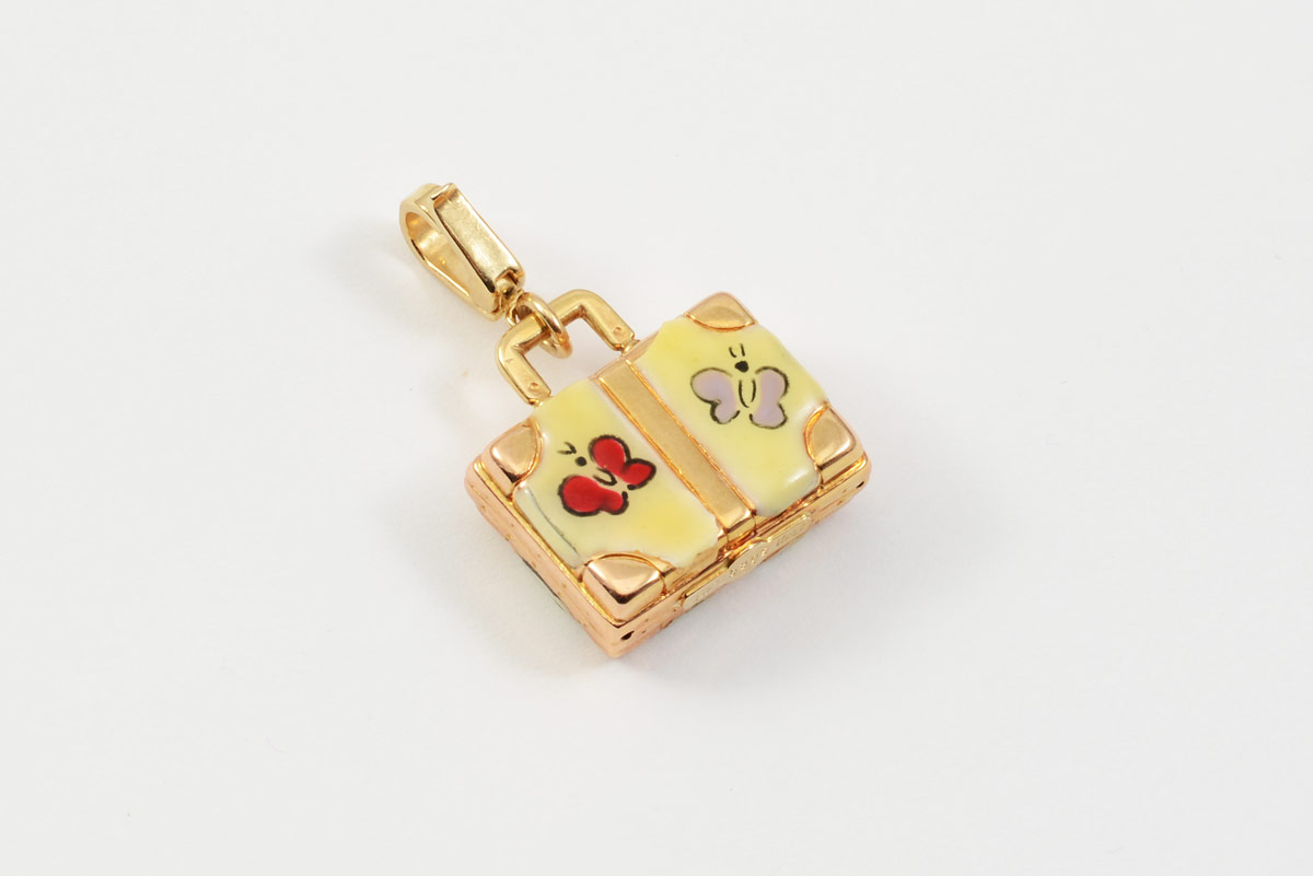 Appraisal: K ENAMELED GOLD ITALIAN CHARM In the form of a