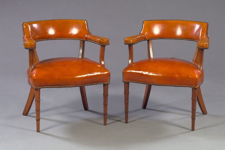 Appraisal: Pair of English Regency-Style Leather-Covered Armchairs ca each of captain's