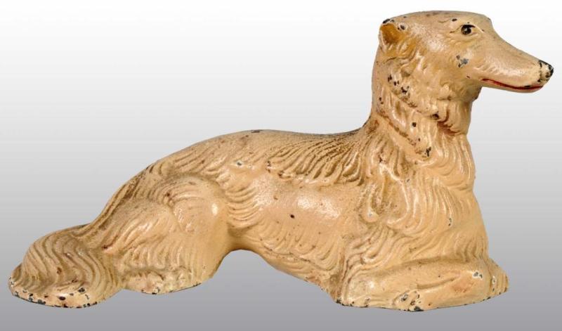 Appraisal: Cast Iron Laying Down Wolfhound Paperweight Description Made by Hubley