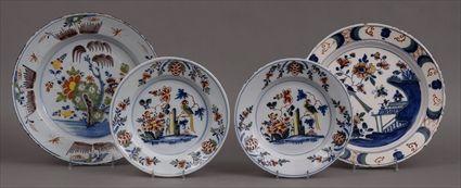 Appraisal: ASSEMBLED PAIR OF BRISTOL POLYCHROME DELFT PLATES A BRISTOL CHARGER