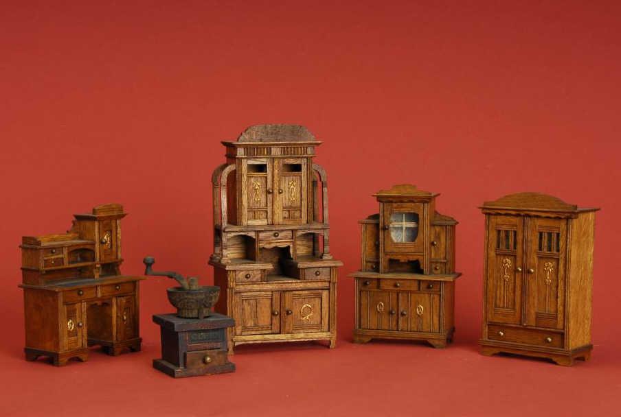 Appraisal: German Oak Dollhouse Furniture Germany ca a handsome matched set