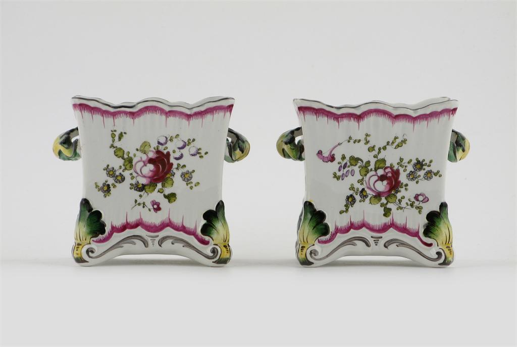 Appraisal: A pair of pearlware bough pots and covers