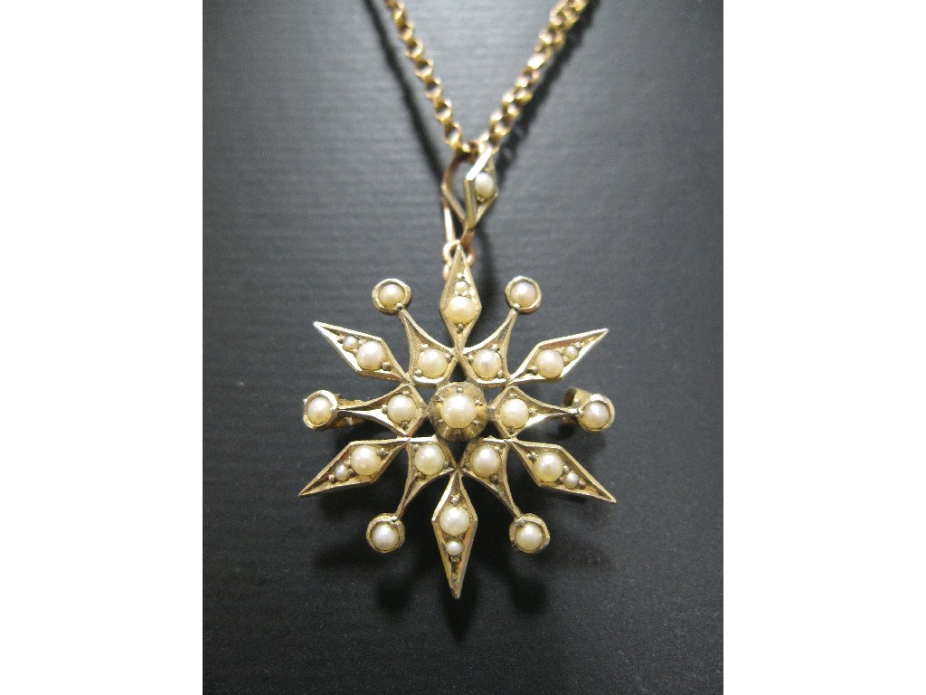 Appraisal: Edwardian ct gold seed pearl set starburst brooch pendant on