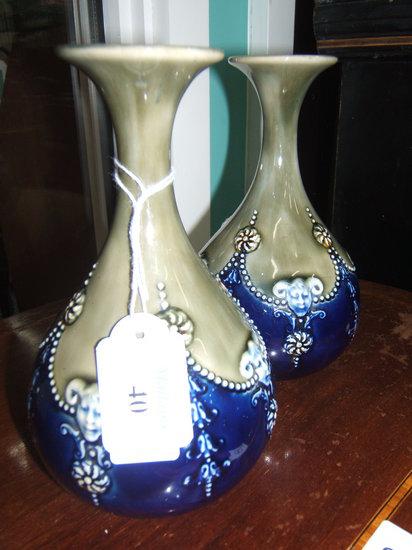 Appraisal: A pair of Royal Doulton vases with mask decoration high