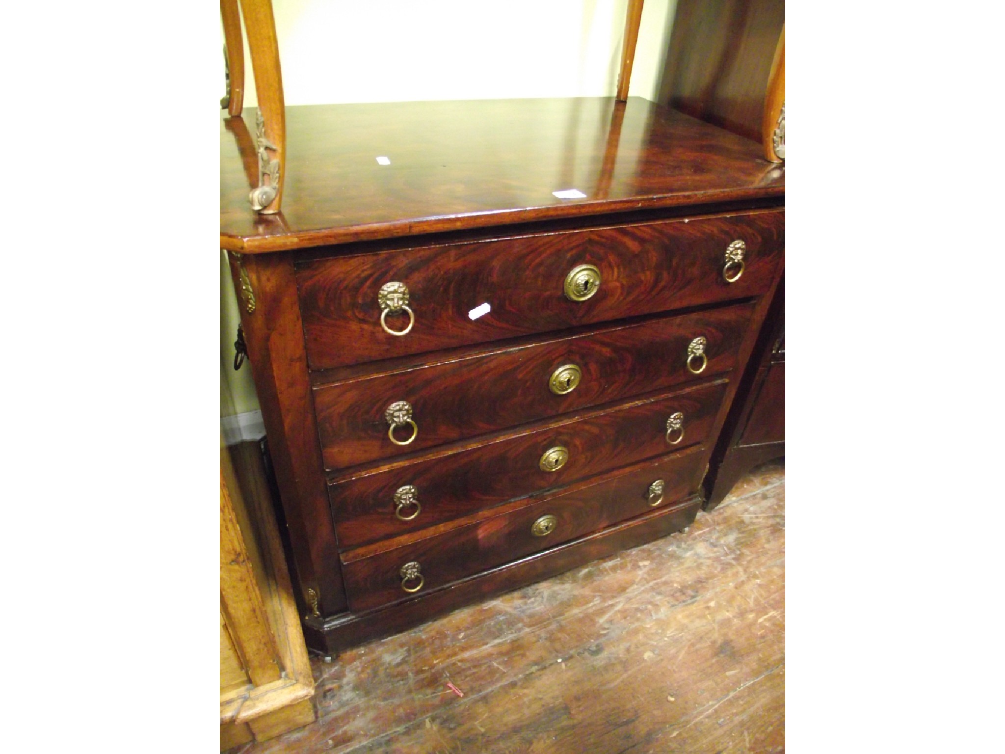 Appraisal: A th century mahogany French commode of four long oak