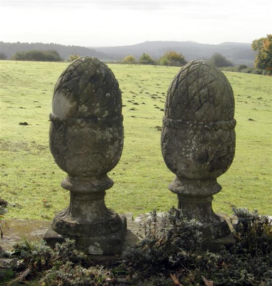 Appraisal: Pair of antique carved stone acorn finials Provenance removed from