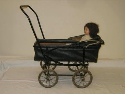 Appraisal: An early th century dolls pram with canvas body and