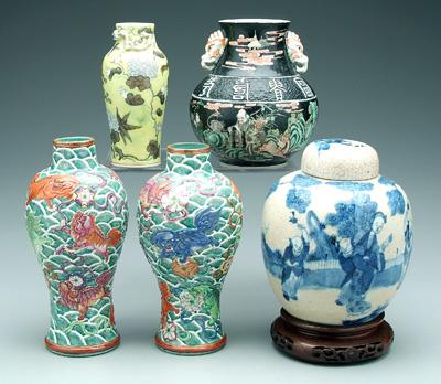 Appraisal: Five Chinese porcelain vases two similar lions pursuing brocaded balls