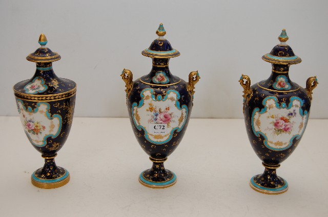 Appraisal: GARNITURE OF ROYAL CROWN DERBY HAND PAINTED LIDDED VASES IN