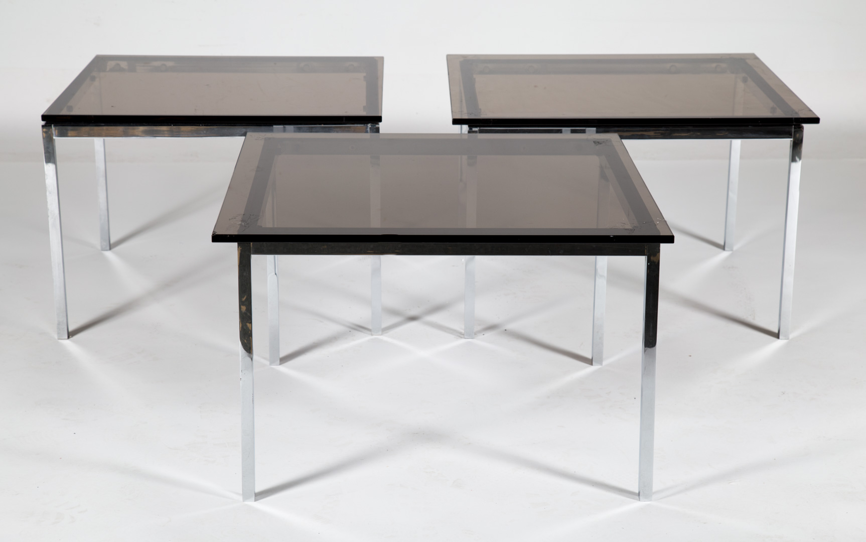 Appraisal: Set of Mid-century Modern Knoll tables circa s smoked glass