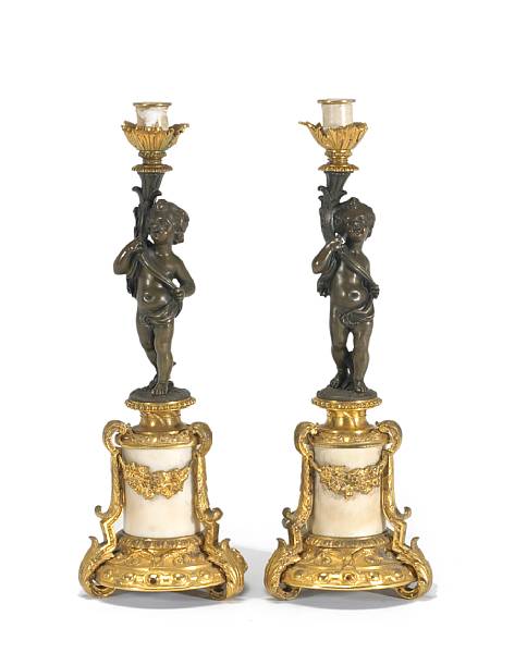 Appraisal: A pair of Neoclassical style patinated gilt bronze and marble