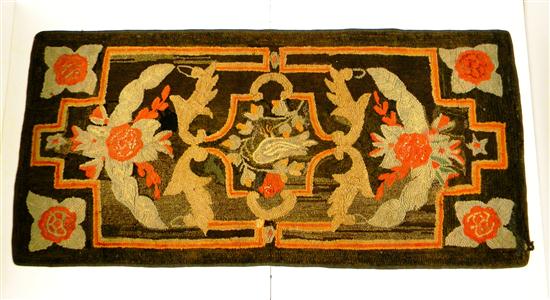 Appraisal: Hooked rug dark green and red with floral bird motif