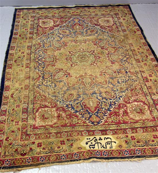 Appraisal: Persian red ground rug multiple borders the centre blue ground