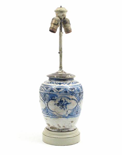 Appraisal: An Oriental blue and white glazed earthenware jar form table