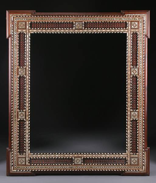 Appraisal: A Levantine shell and bone mounted parcel ebonized hardwood mirror