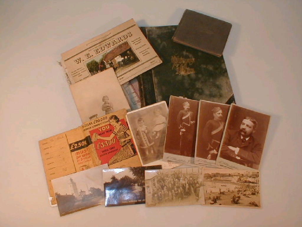 Appraisal: A photograph album assorted early thC photographs newspaper photograph album