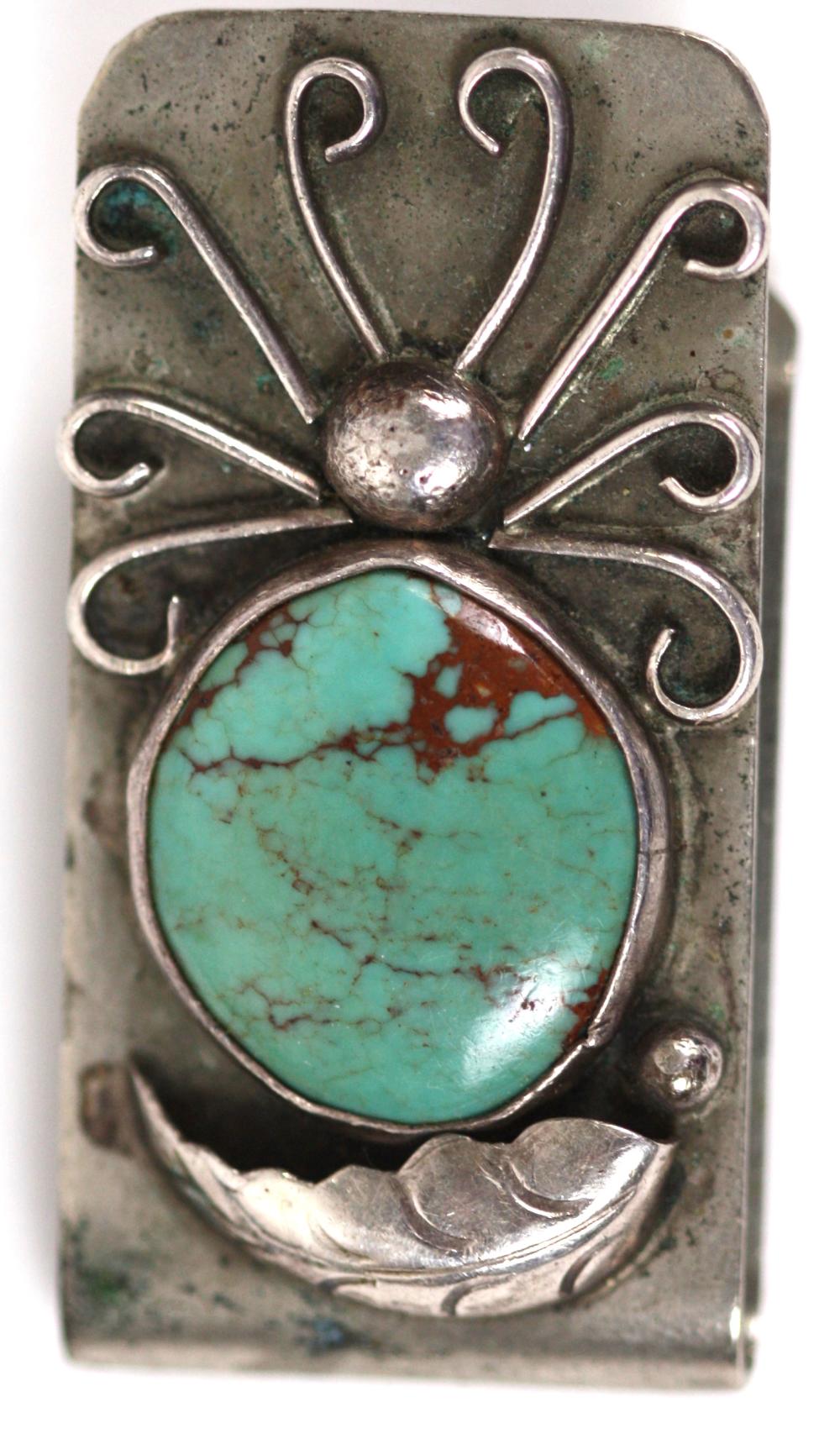 Appraisal: NAVAJO TURQUOISE-MOUNTED SILVER MONEY CLIPThe turquoise with red veins the