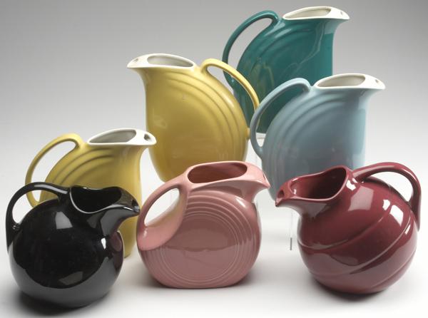 Appraisal: FIESTA-STYLE PITCHERS Seven pieces including one Fiesta five Hall and