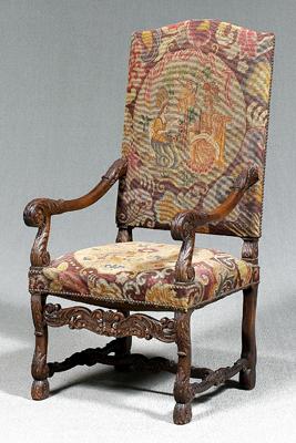 Appraisal: Flemish style carved walnut chair needlework back and seat finely