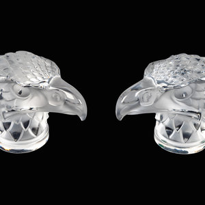 Appraisal: Two Lalique Glass Paperweights Tete d'Aigle TH ST CENTURY each