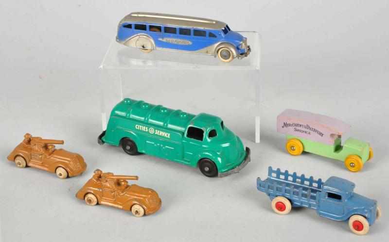 Appraisal: Lot of Vehicle Toys Description American Includes two Barclay Army