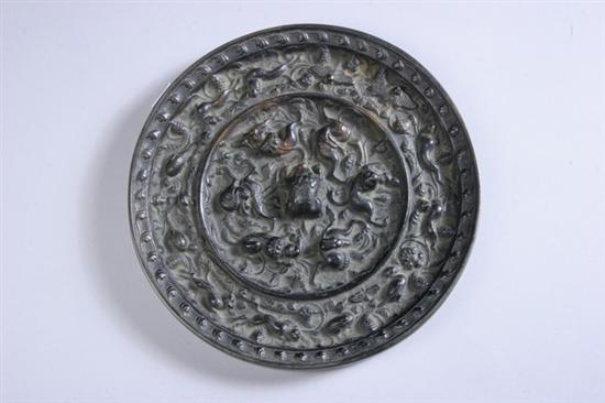 Appraisal: CHINESE BRONZE MIRROR Tang Dynasty or later Cast to depict