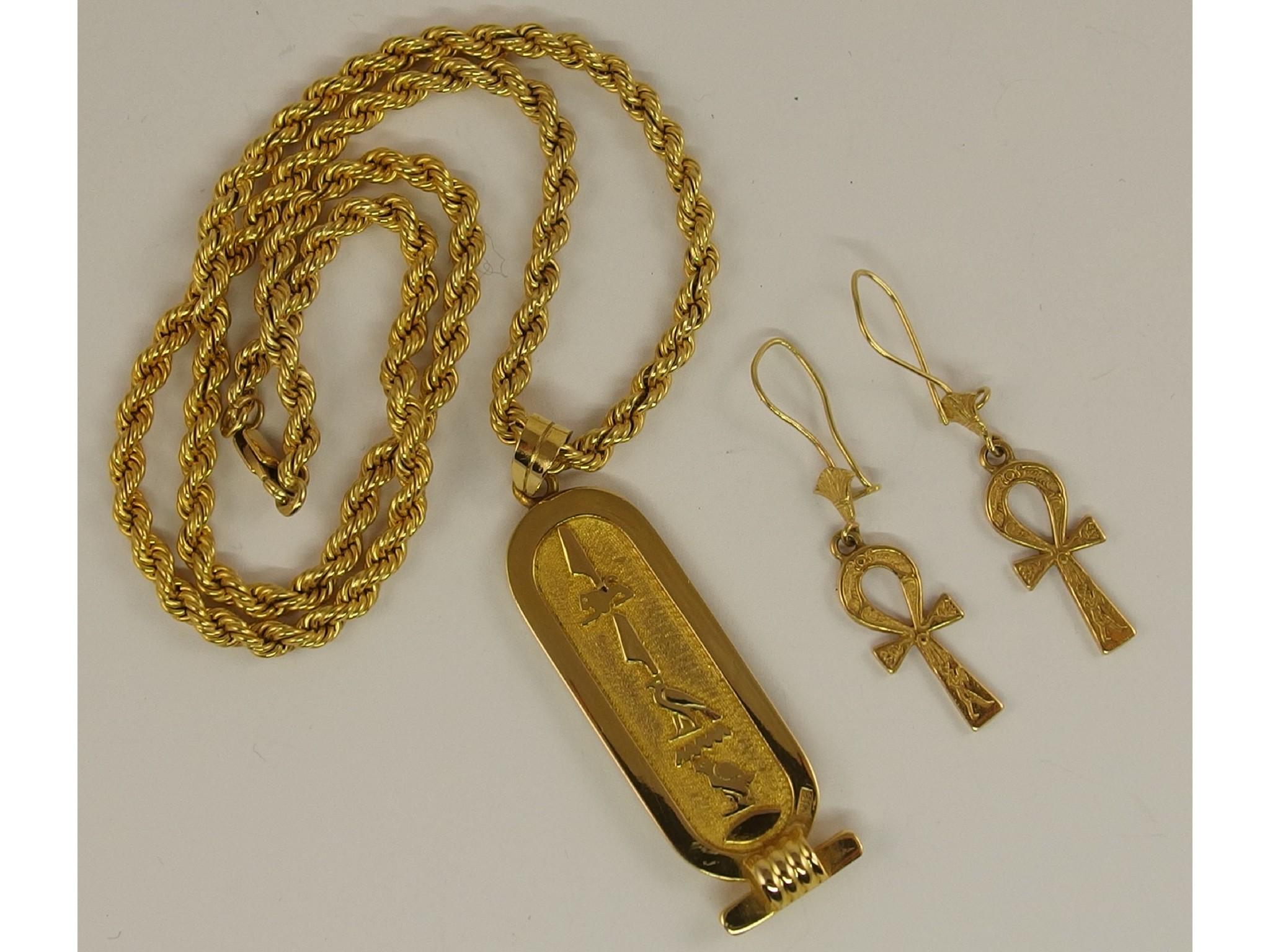 Appraisal: An ct gold Egyptian hieroglyph pendant Egyptian hallmarks to pendant