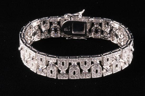 Appraisal: SIGNED HARRY WINSTON PLATINUM-ON-STERLING SILVER OPENWORK STRAP BRACELET Stamped FAS