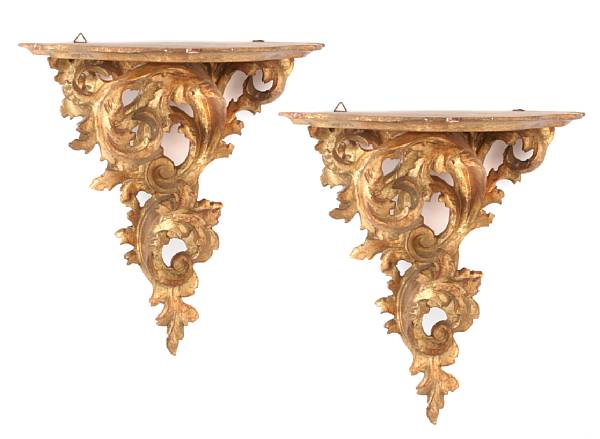 Appraisal: A pair of Italian Rococo giltwood wall brackets height in