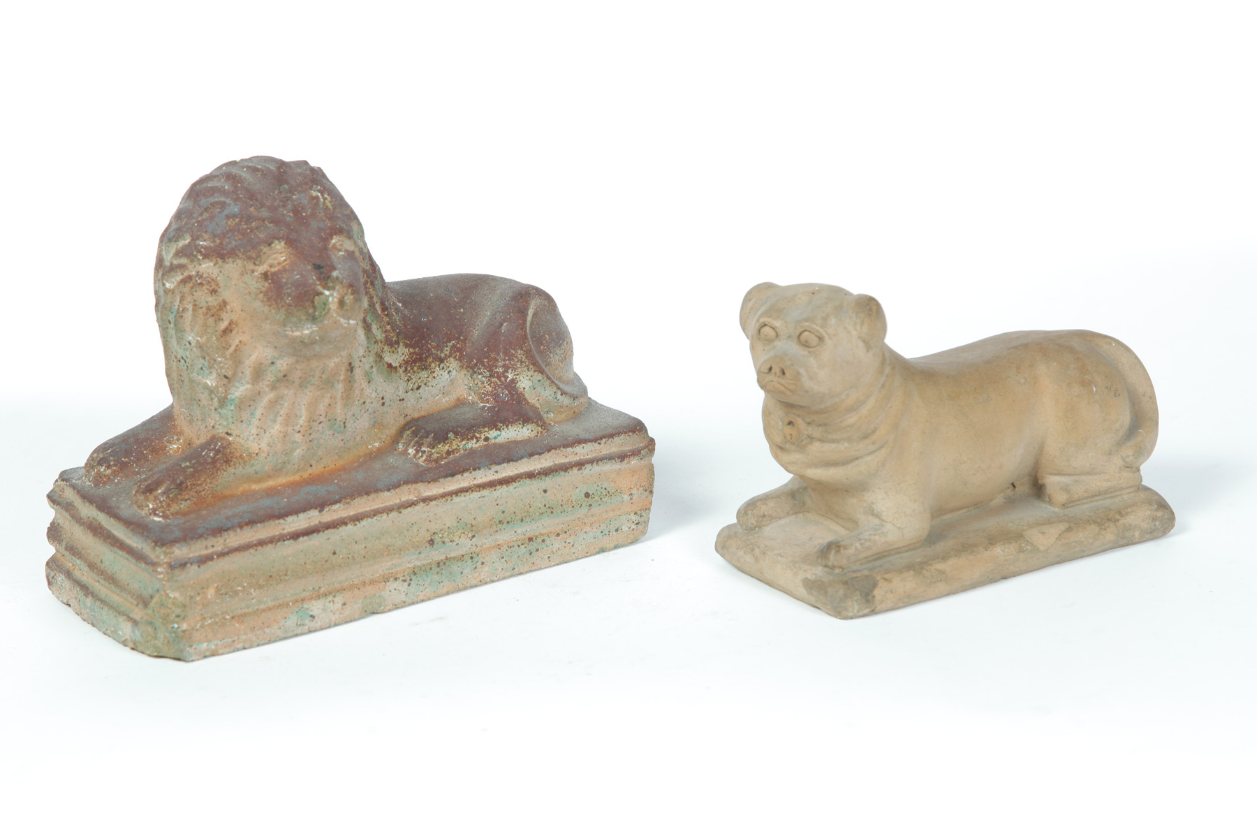 Appraisal: OHIO SEWERTILE LION AND DOG Early th century Reclining lion