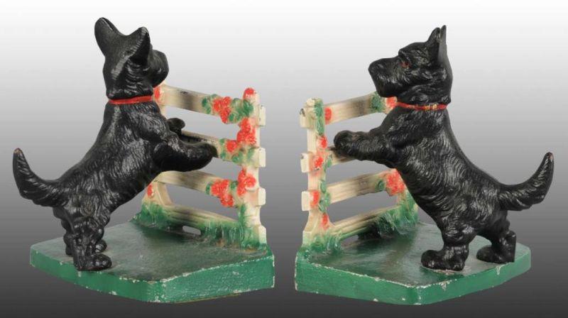 Appraisal: Scottie Leaning on Rose Fence Cast Iron Bookends Description Made