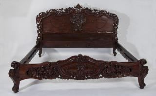 Appraisal: Rococo style carved mahogany king bedstead h Mahogany king size