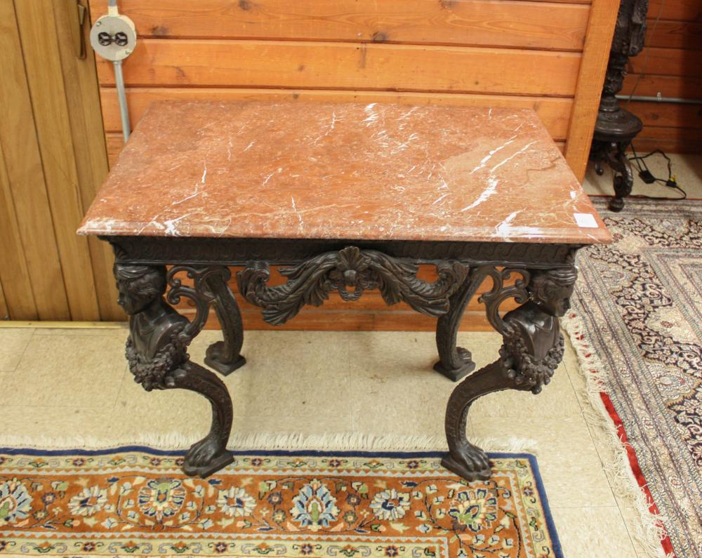 Appraisal: MARBLE-TOP BRONZE CENTER TABLE having a rectangular rouge marble top