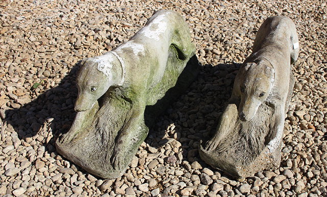 Appraisal: TWO COMPOSITE GREYHOUND SCULPTURES cm long x cm high