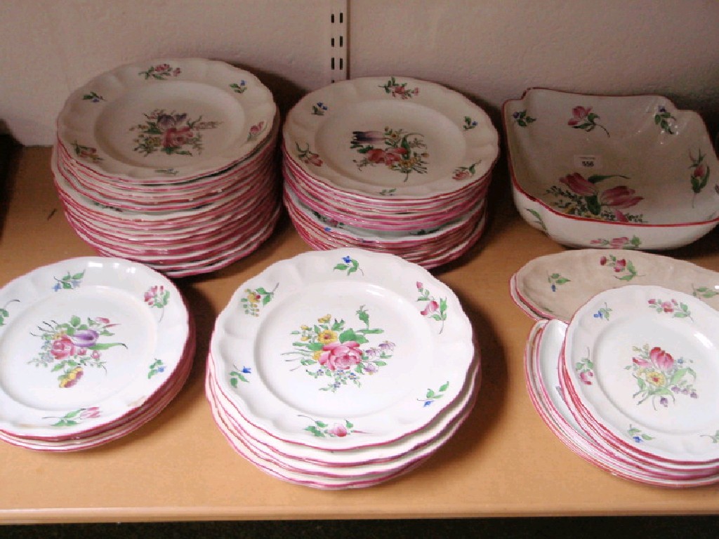 Appraisal: A Luneville French semi porcelain dinner service comprising square serving