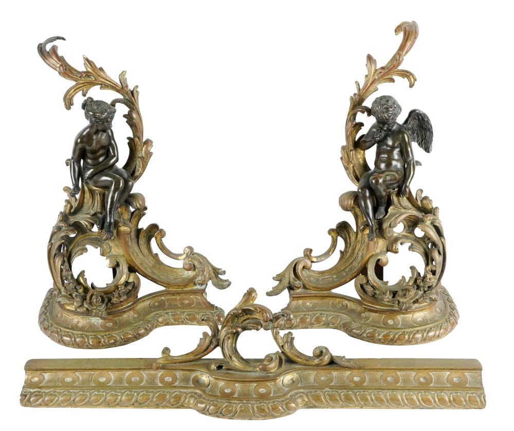 Appraisal: PAIR OF ROCOCO-STYLE PATINATED METAL FIGURAL CHENETSwith fender Dimensions each