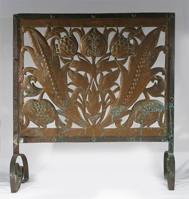 Appraisal: A copper and wrought iron firescreen the pierced copped panel