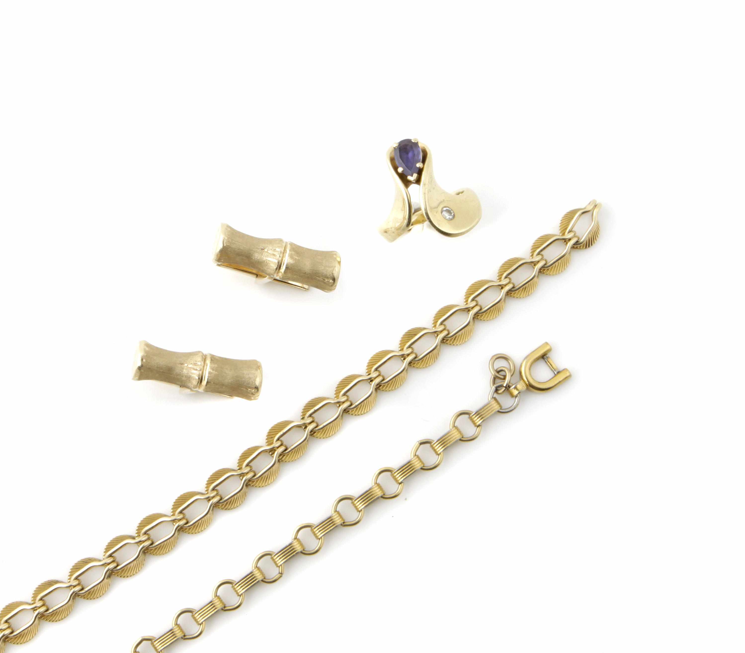 Appraisal: A group of gold and blue stone jewelry comprising a