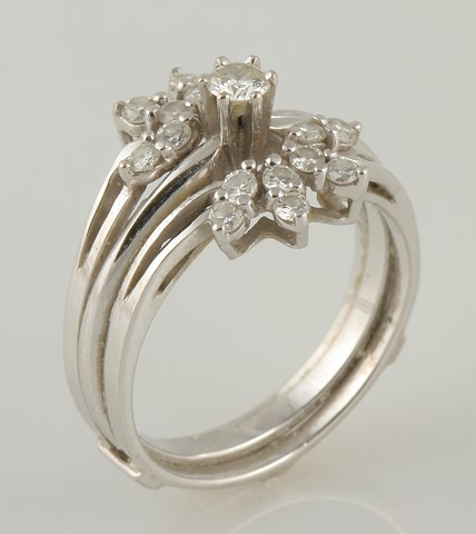 Appraisal: KW diamond solitaire with diamond wrap mm round diamond Wrap