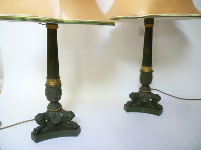 Appraisal: A PAIR OF BRONZED REGENCY STYLE CANDLESTICKS of Corinthian column