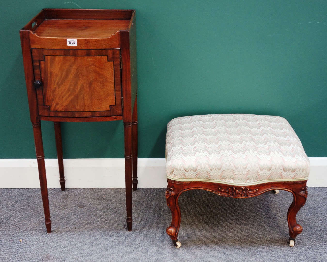 Appraisal: A Regency mahogany bowfront single door night stand on turned