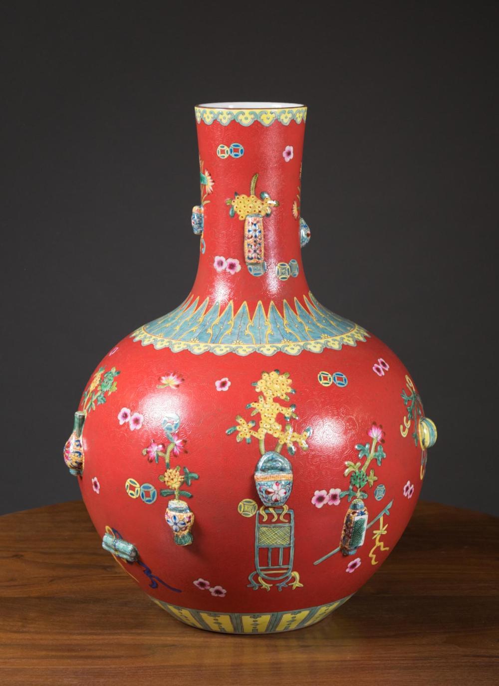 Appraisal: CHINESE PORCELAIN VASE bottle form with high relief and red