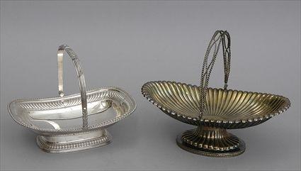 Appraisal: HYDE GOODRICH SILVER CAKE BASKET AND AN ENGLISH SILVER-PLATED BASKET