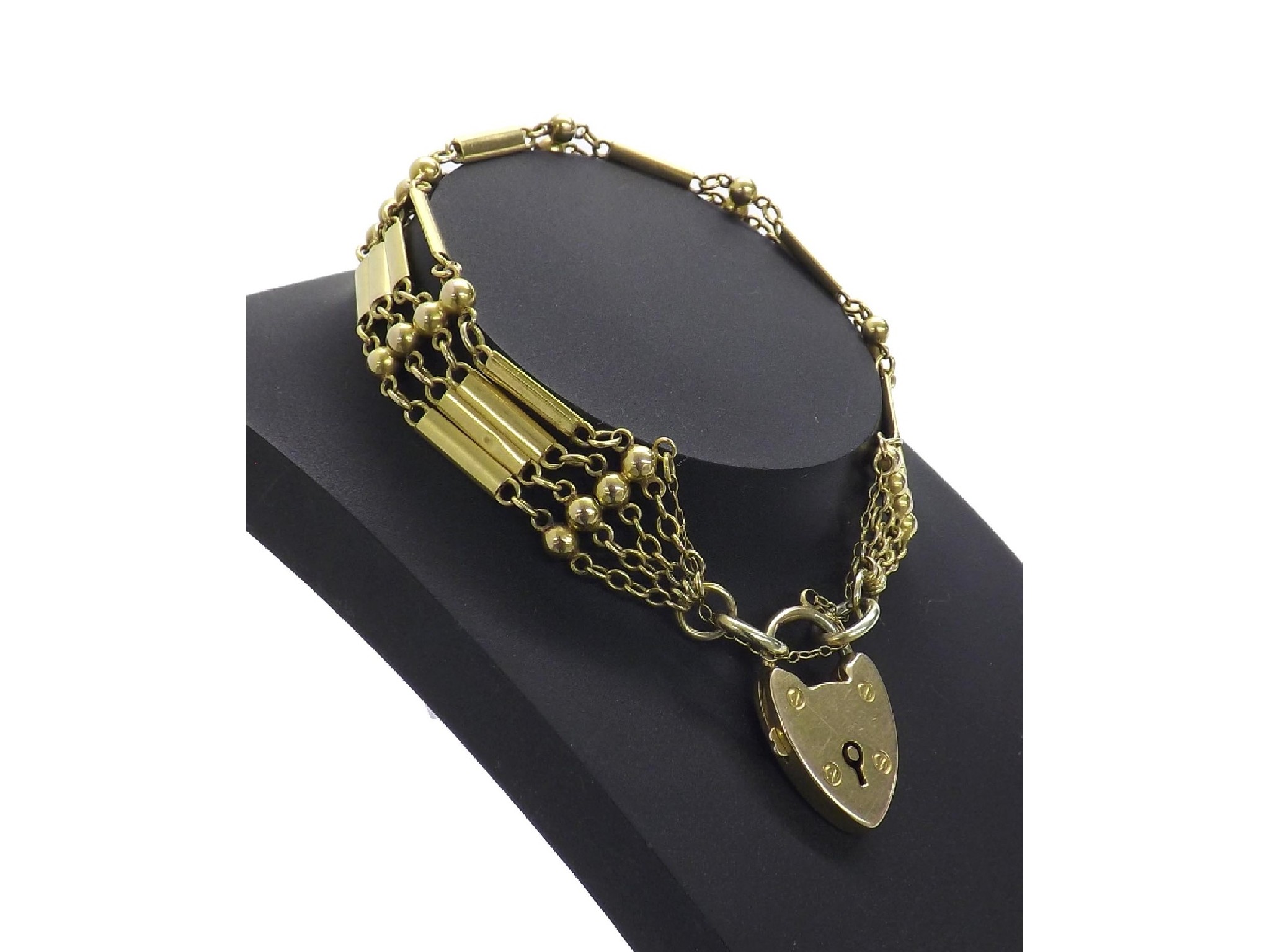 Appraisal: ct gate bracelet with padlock and safety chain gm