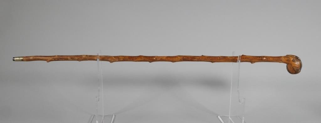 Appraisal: Antique folk art handmade walking stick with carved alligator knob